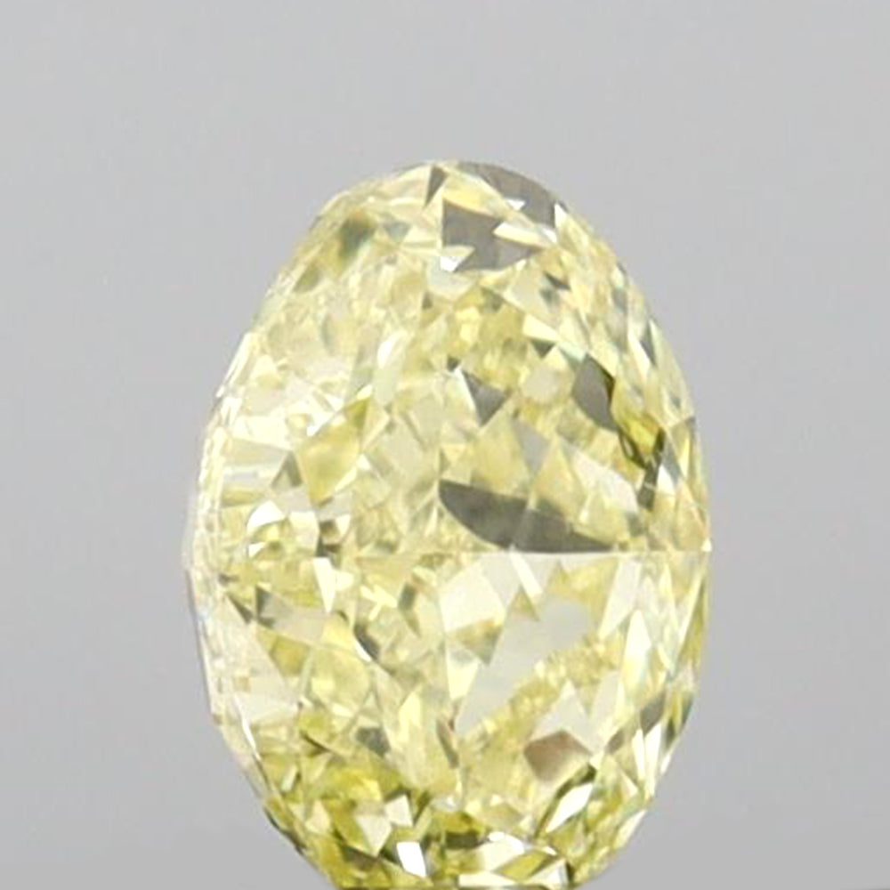 0.31 CT Oval Shape Natural Diamond Yellow Color VS1 Clarity (4.88 MM)