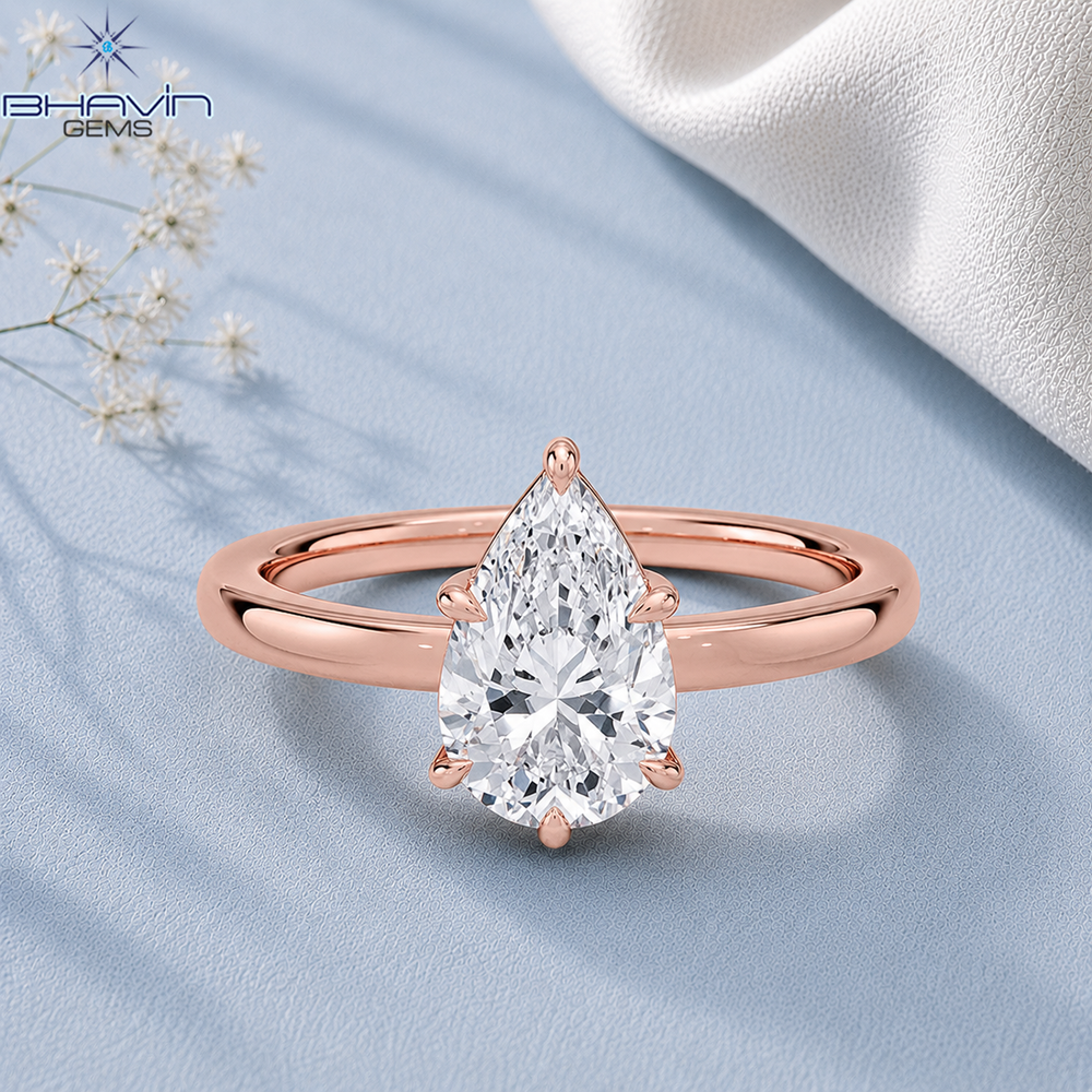 Pear Cut Solitaire Engagement Ring with 5-Prong Wire Basket in Rose Gold