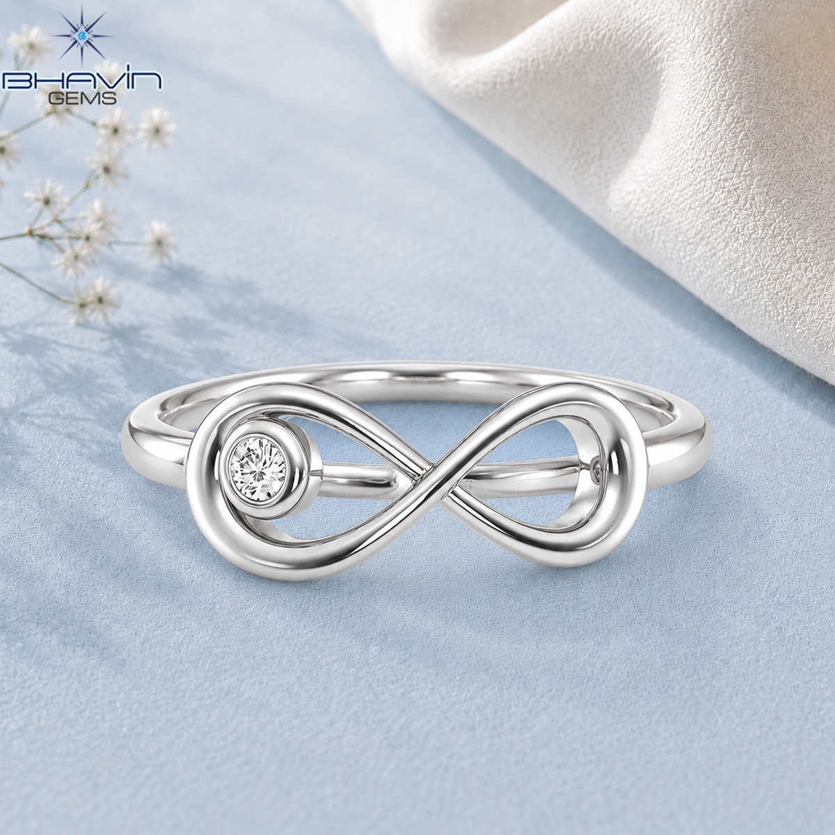 Elegant Infinity Symbol Diamond Ring with Bezel Set Round Diamond