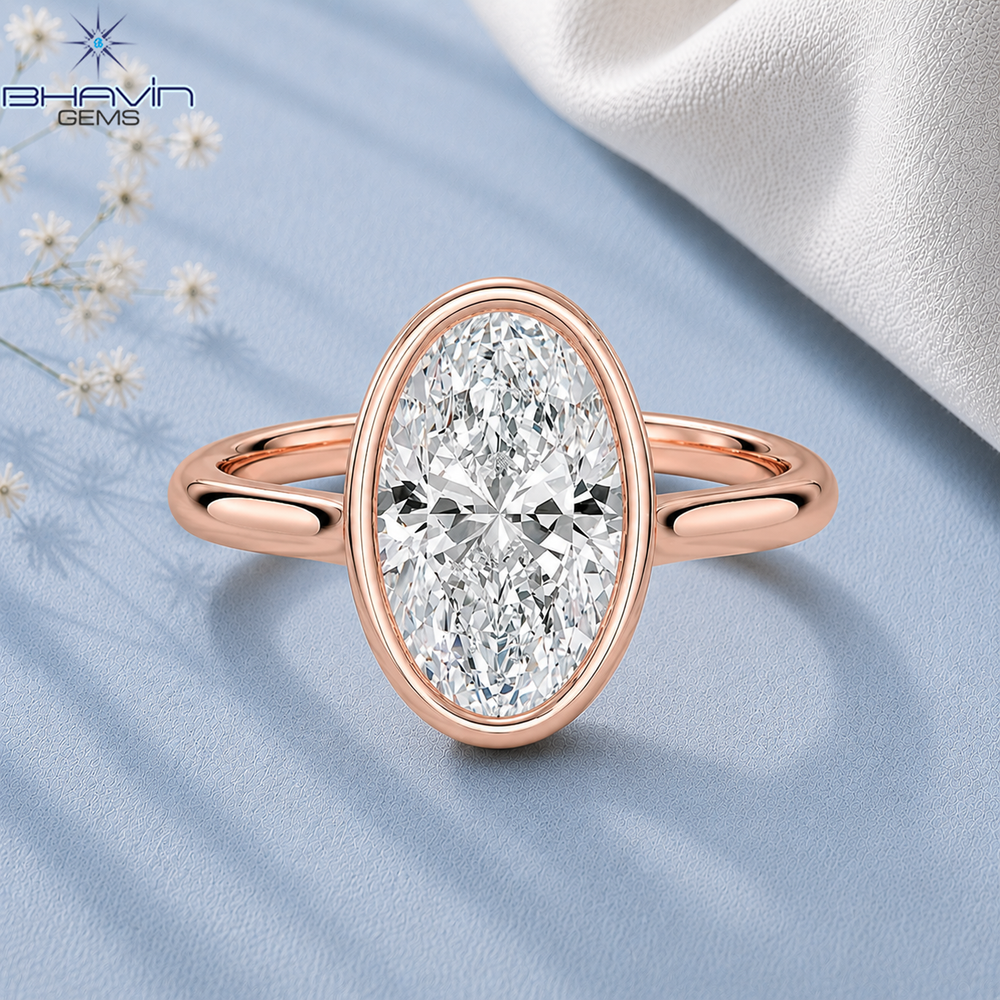 Oval Cut Bezel Set Solitaire Engagement Ring in Rose Gold