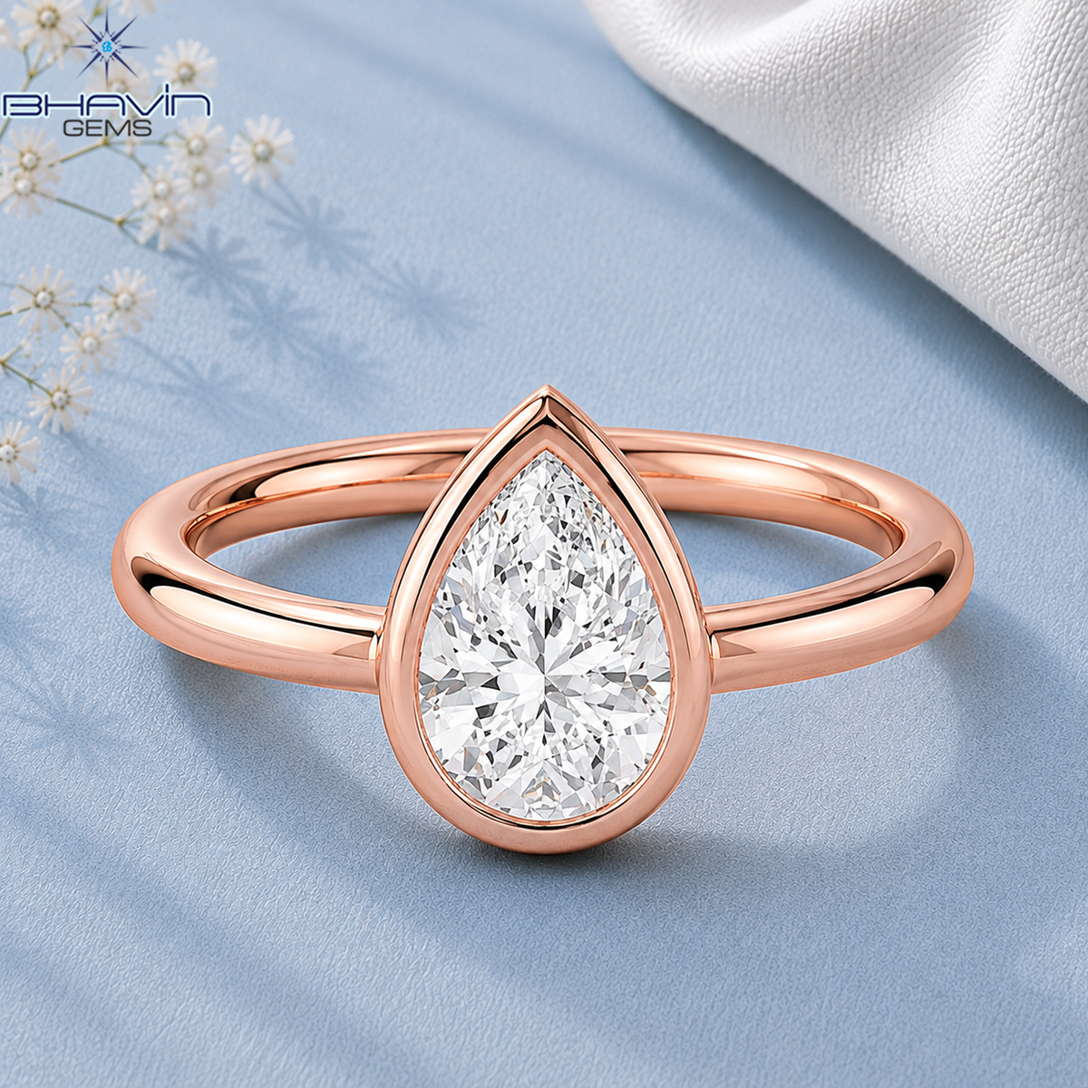 Elegant Pear Cut Solitaire Ring with Sleek Bezel Design