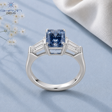 Emerald Cut Three Stone Engagement Ring with Tapered Baguette Setting