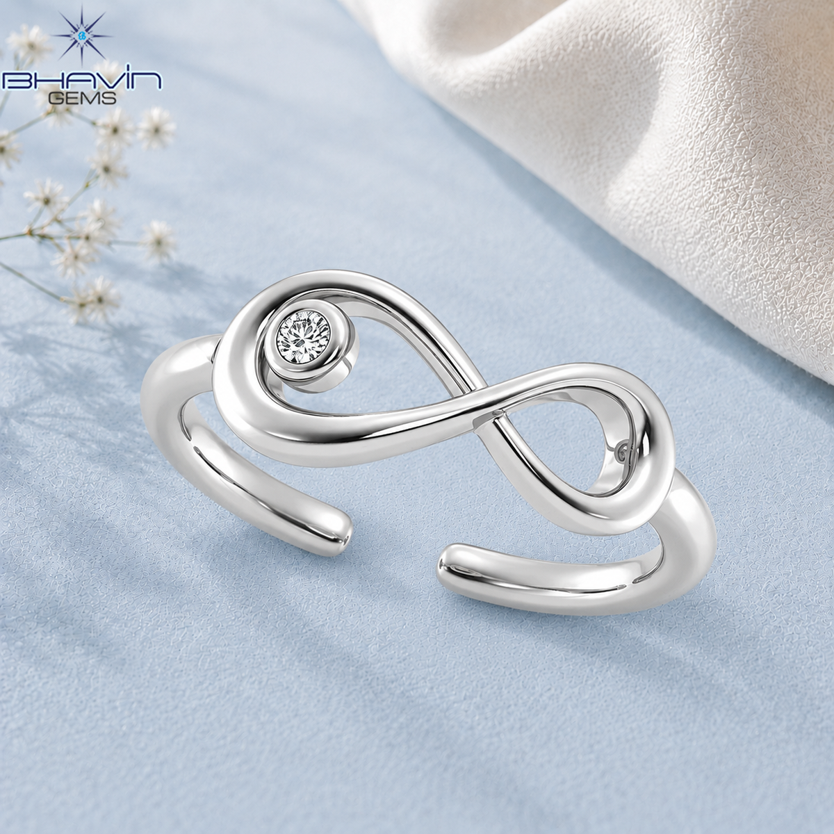 Elegant Infinity Symbol Diamond Ring with Bezel Set Round Diamond