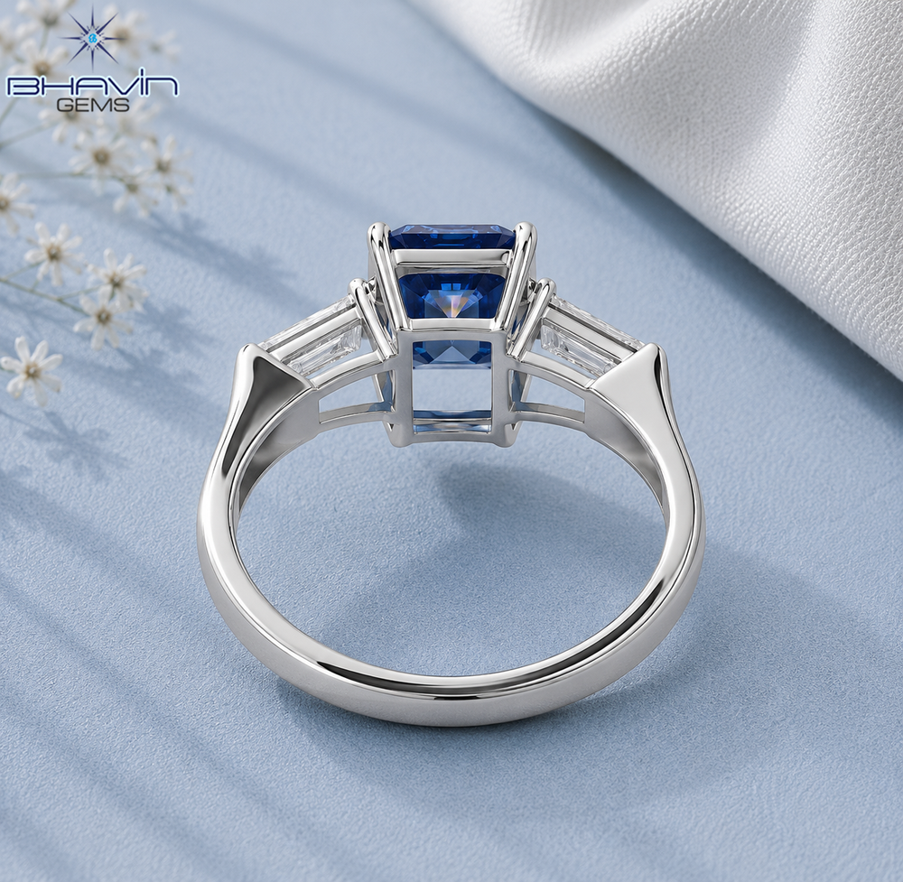 Emerald Cut Three Stone Engagement Ring with Tapered Baguette Setting