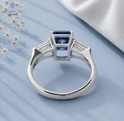 Emerald Cut Three Stone Engagement Ring with Tapered Baguette Setting