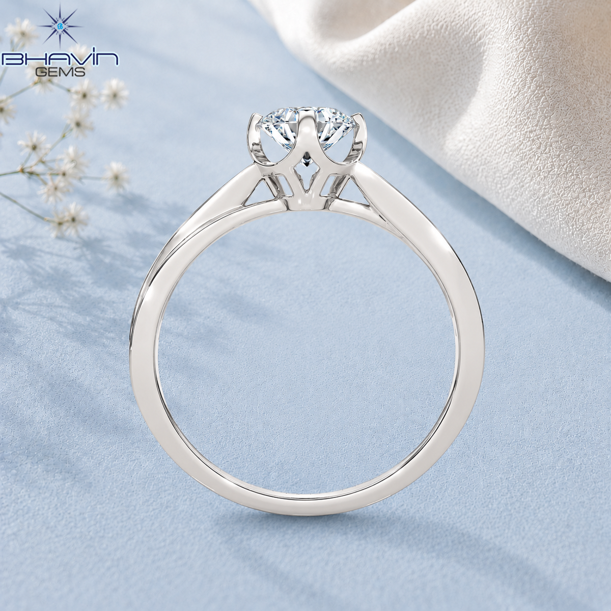 Elegant Round Cut Diamond Solitaire Ring with Twisted Split Shank Setting