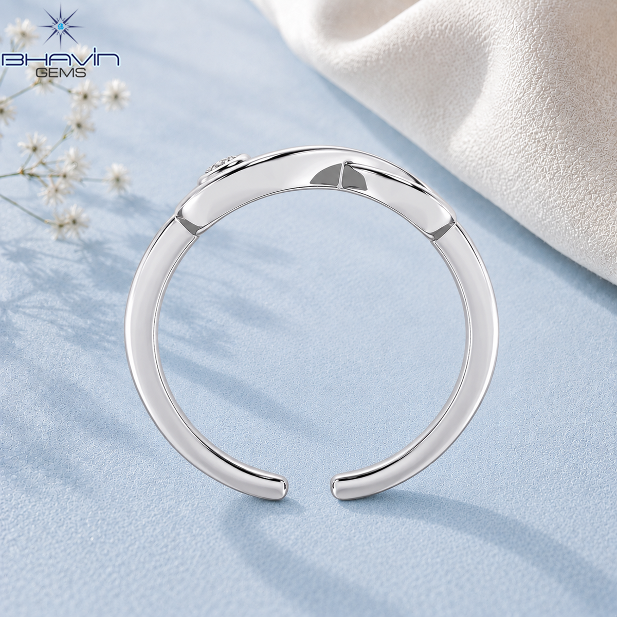 Elegant Infinity Symbol Diamond Ring with Bezel Set Round Diamond