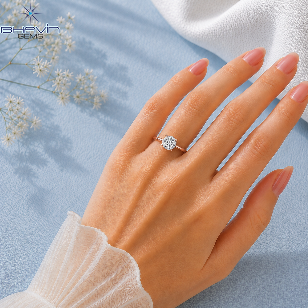 Round Brilliant Cut Solitaire Engagement Ring with Petite Claw Prongs in Rose Gold