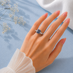 Emerald Cut Three Stone Engagement Ring with Tapered Baguette Setting