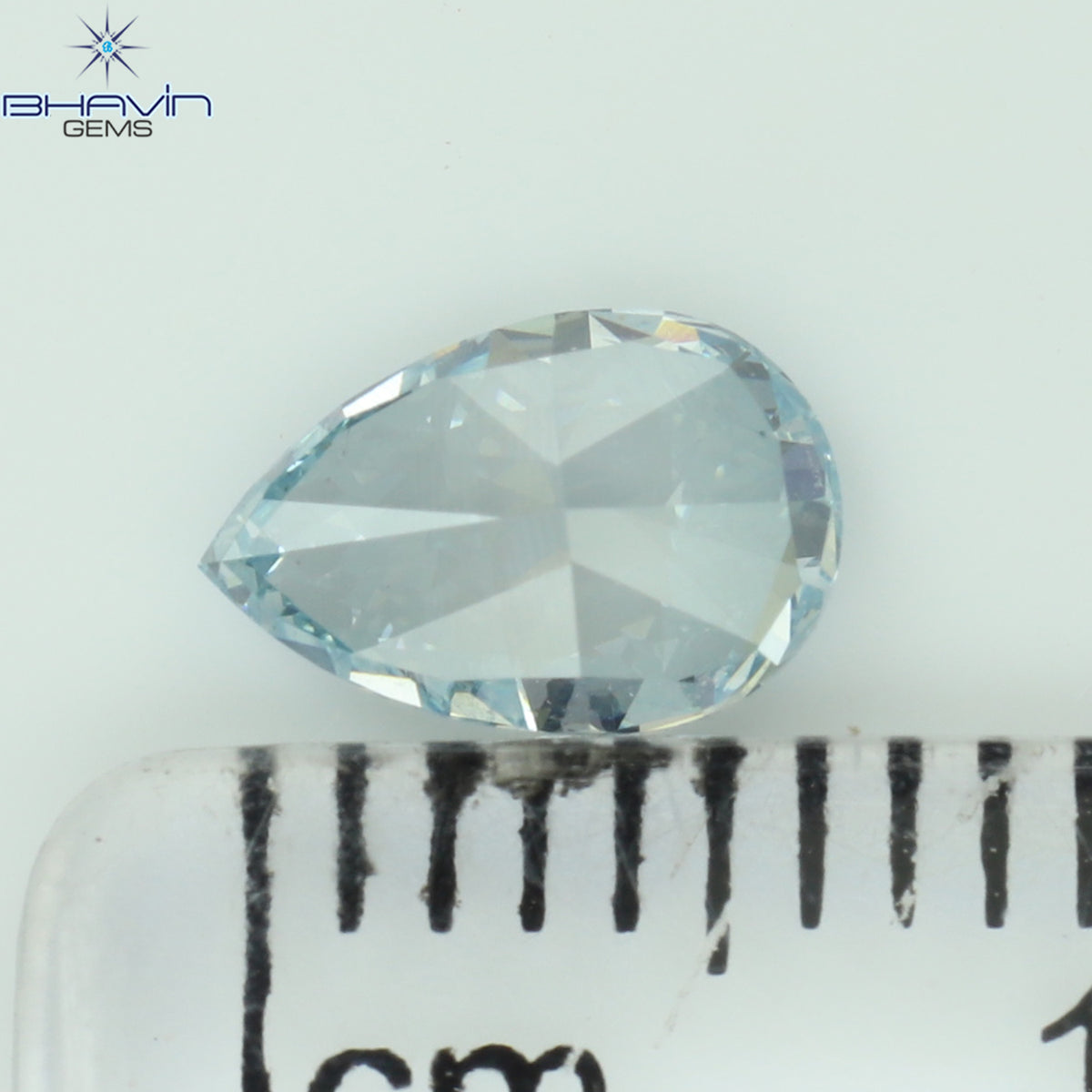0.69 CT Natural Pear Diamond Enhanced Intense Blue Color Clarity VS1 (7.03 MM)
