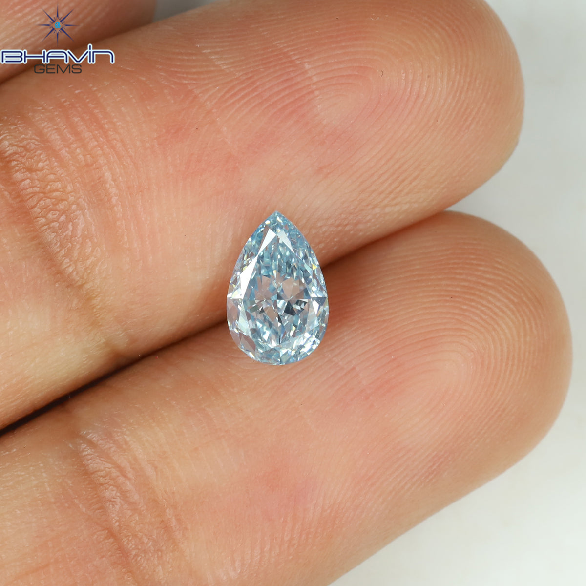 0.69 CT Natural Pear Diamond Enhanced Intense Blue Color Clarity VS1 (7.03 MM)
