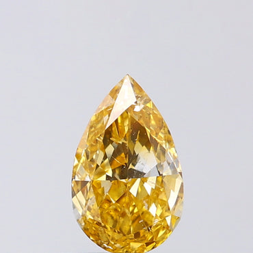 0.72 CT Pear Shape Natural Diamond Orange Color SI2 Clarity (7.54 MM)