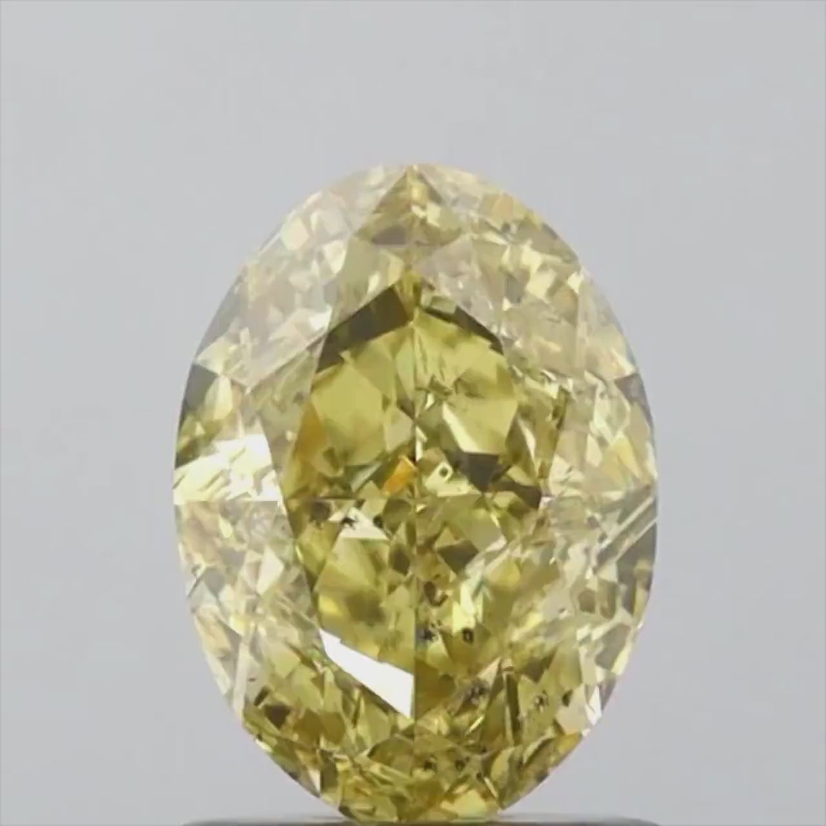 GIA Certified 1.01 CT Oval Shape Natural Diamond Brownish Greenish Yellow (CHAMELEON) Color SI2 Clarity (7.37 MM)