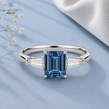 Emerald Cut Three Stone Engagement Ring with Tapered Baguette Setting