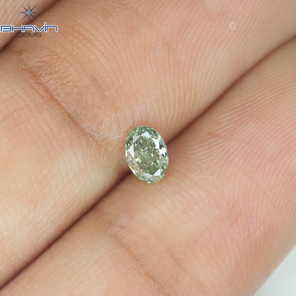0.26 CT Natural Oval Diamond Enhanced Bluish Green Color Clarity VS1 (4.42 MM)