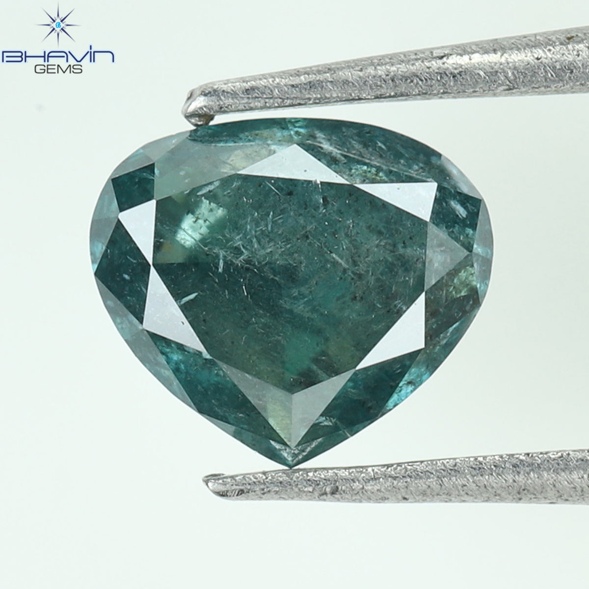 0.57 CT Heart Natural Diamond Enhanced Greenish Blue Color Clarity I3 (5.03 MM)