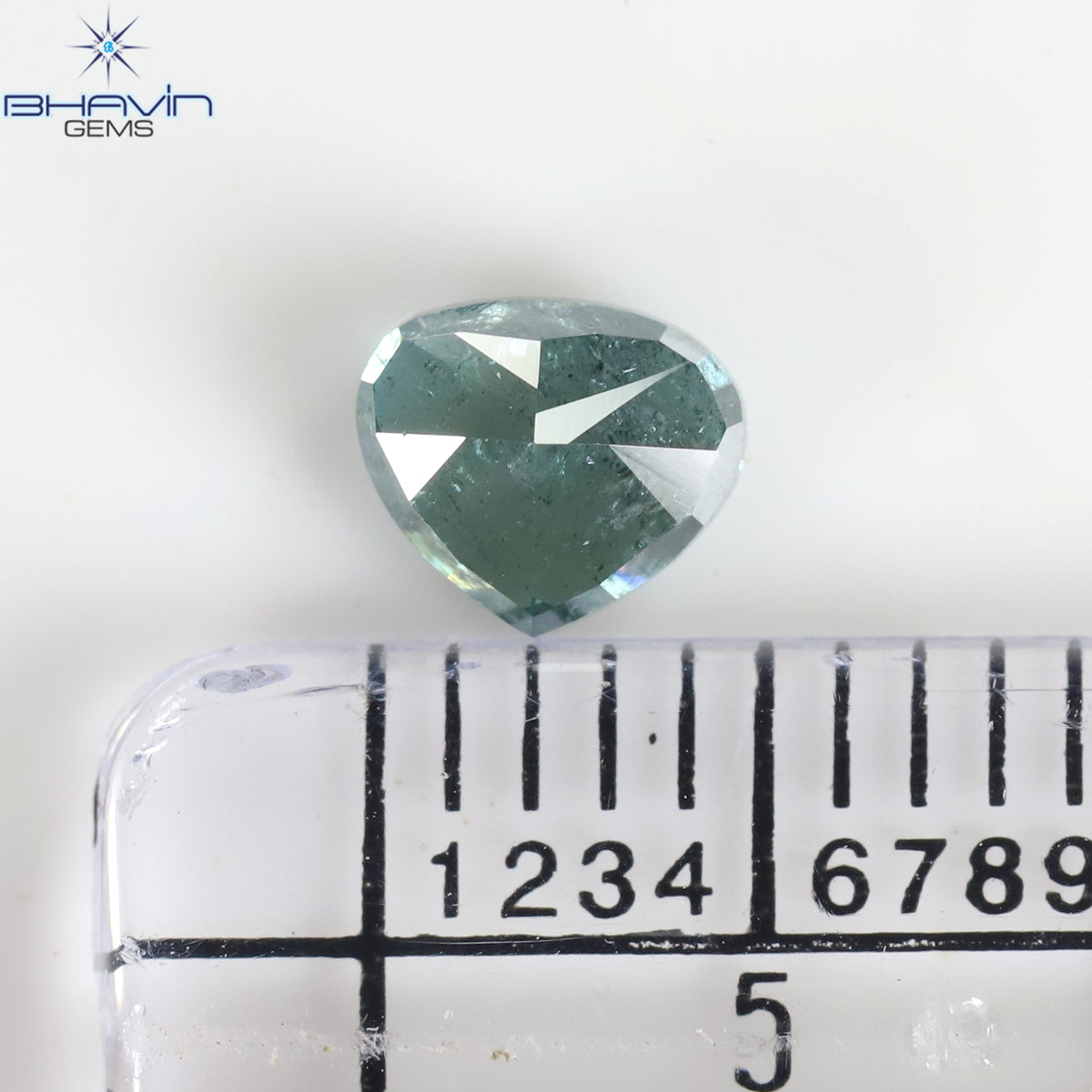 0.57 CT Heart Natural Diamond Enhanced Greenish Blue Color Clarity I3 (5.03 MM)